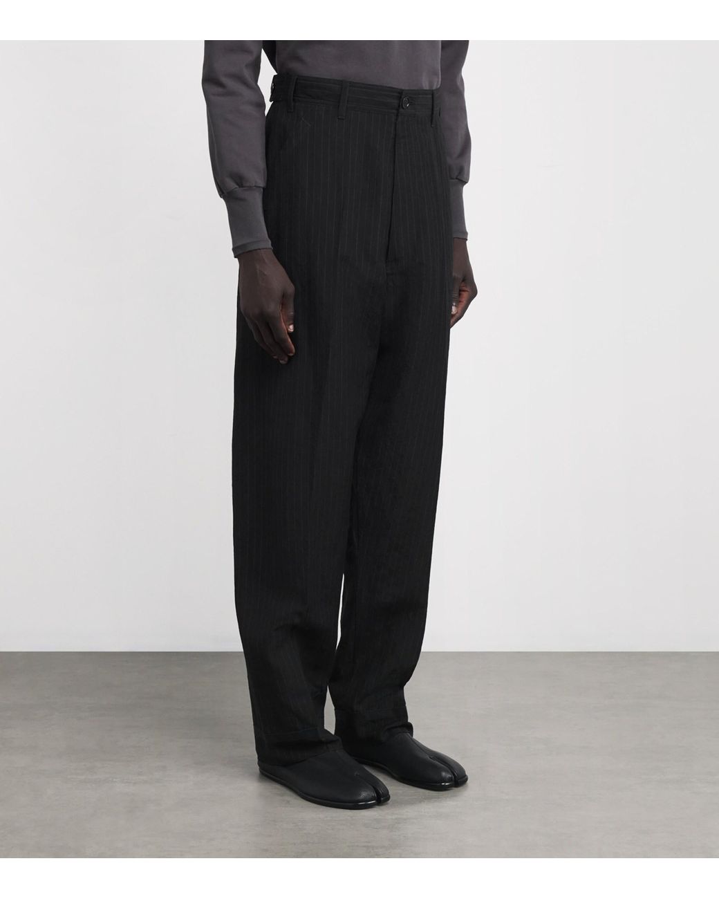 Maison Margiela Wool Four Stitch Pinstripe Trousers in Black Maison Margiela Wool Four Stitch Pinstripe Trousers in Black