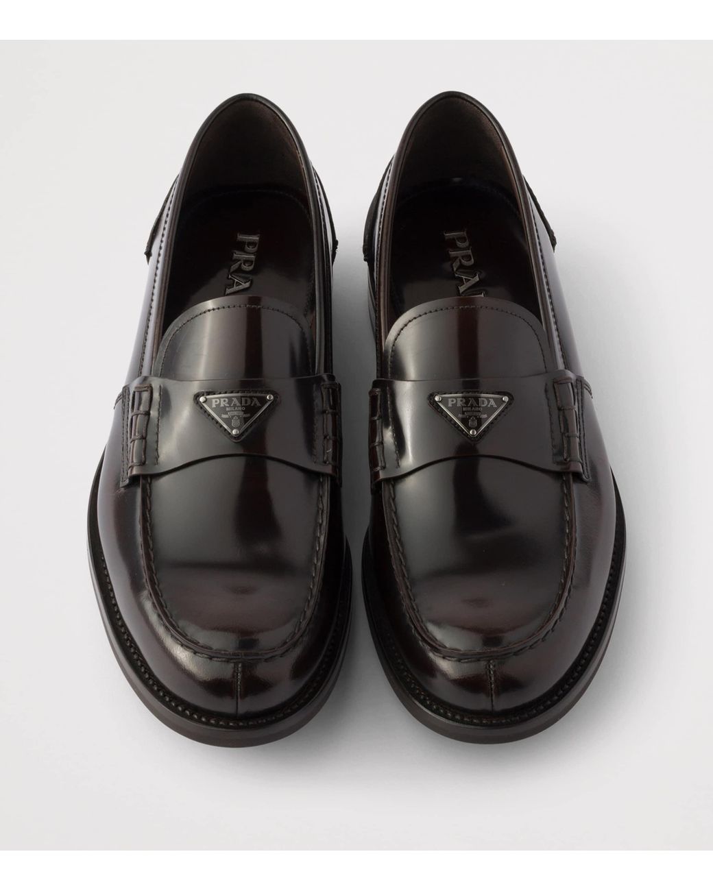 Prada Black Brushed Leather Triangle Loafers for men