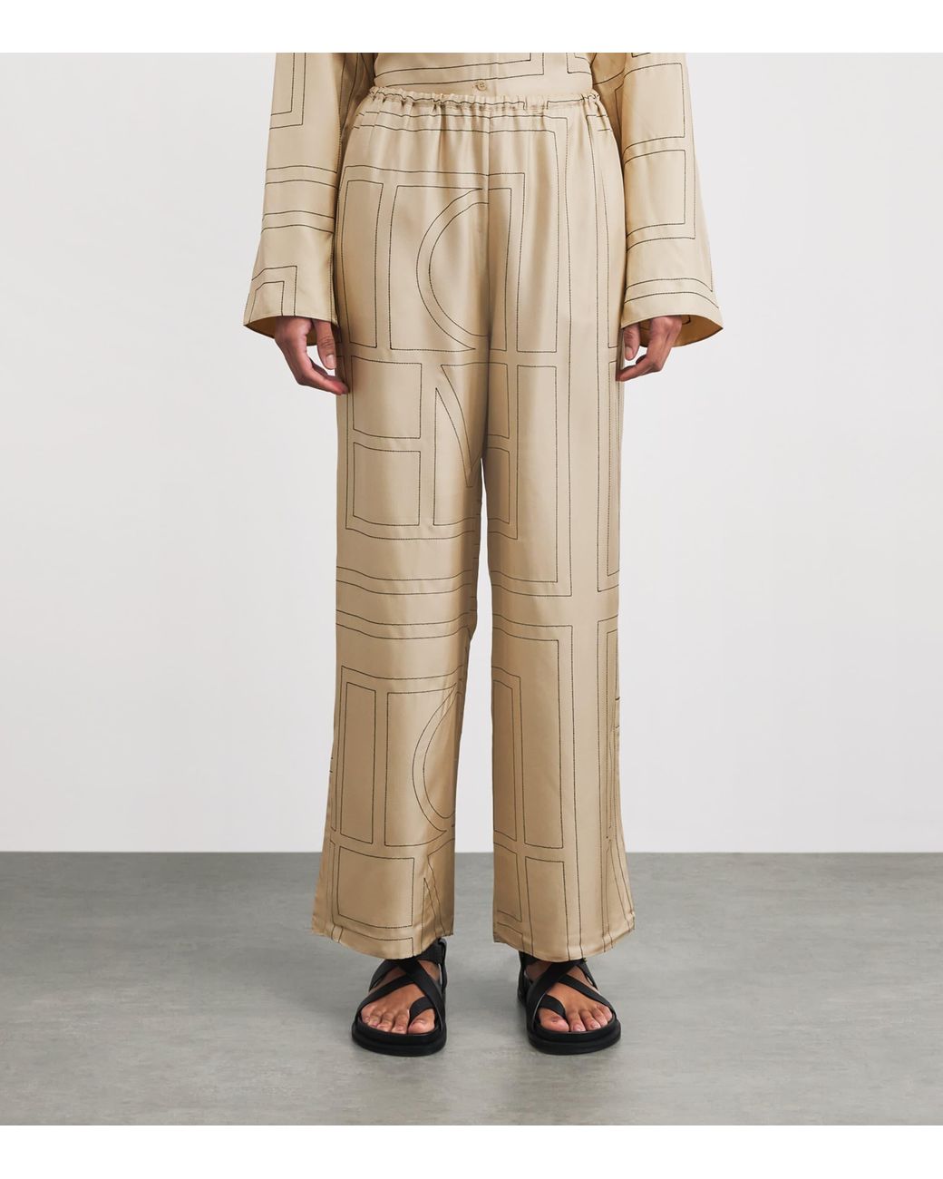 Totême Natural Silk Monogram Trousers