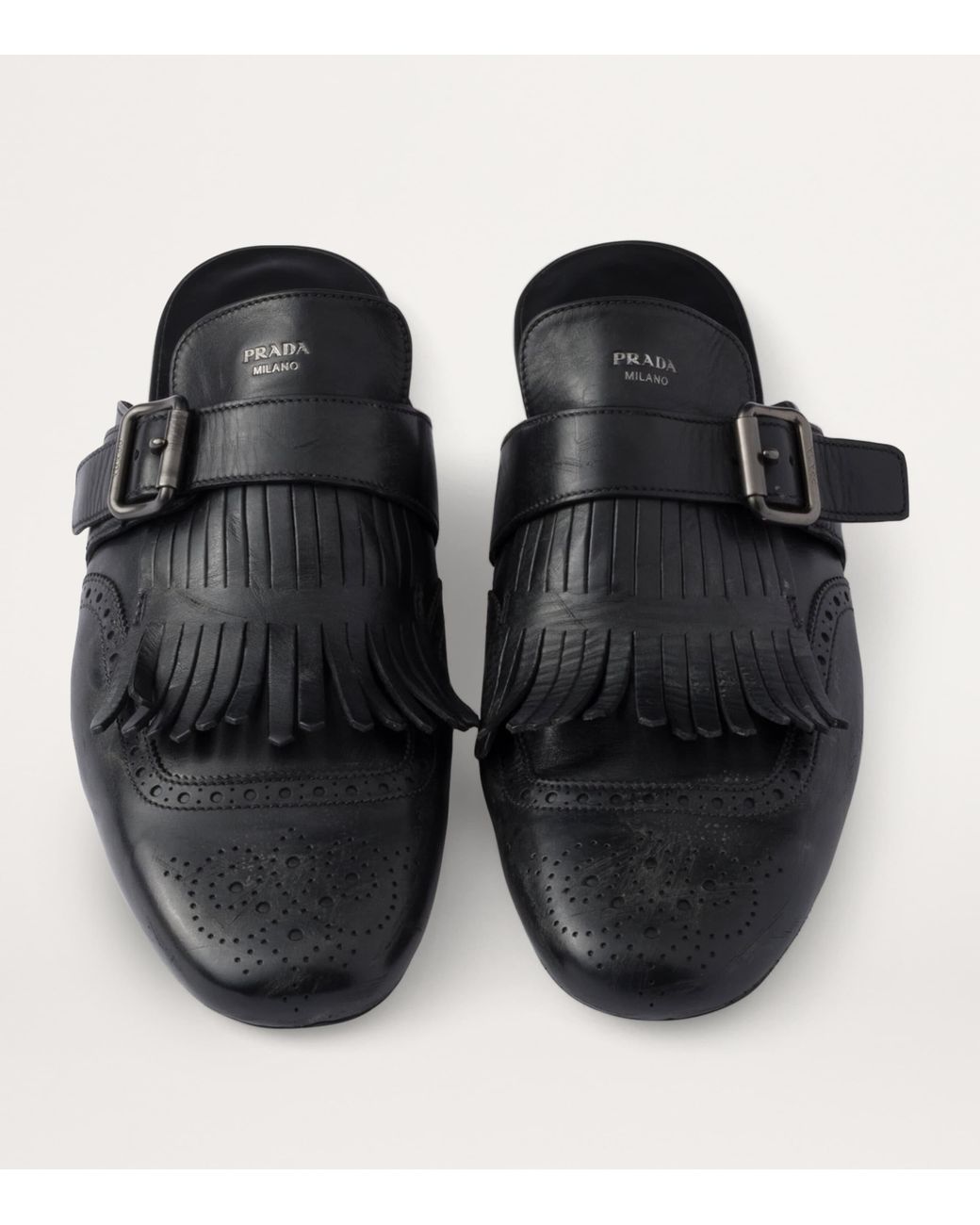 Prada Black Calf Leather Fringed Monk-Strap Mules for men