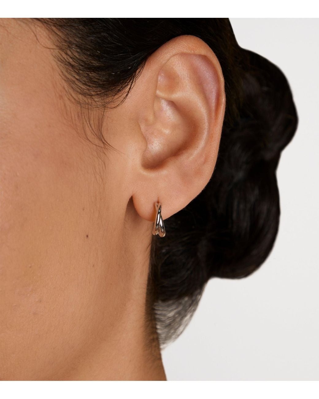 Astrid & Miyu White Crossover Illusion Huggie Earrings