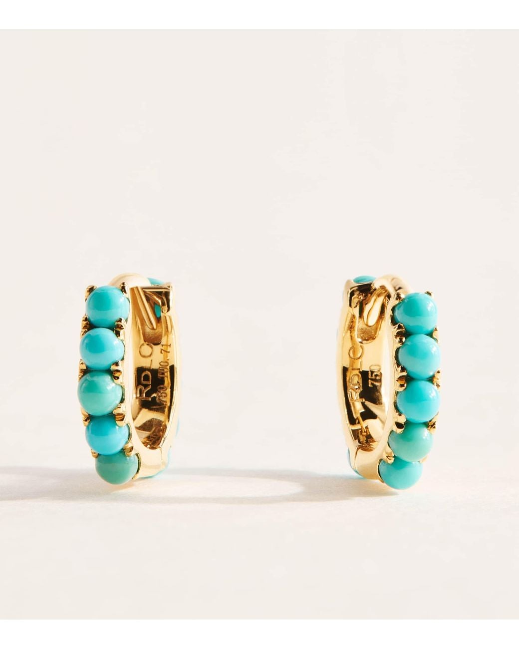 Rosa De La Cruz White And Mini Hoop Earrings