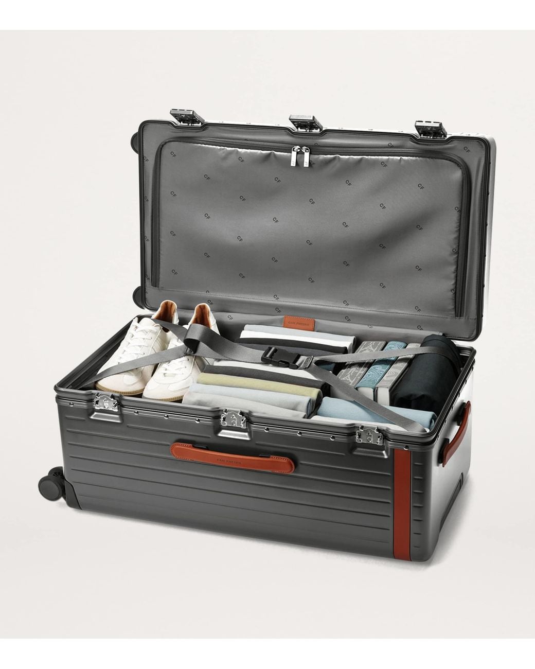 Carl Friedrik Gray Trunk Spinner Check-In Suitcase