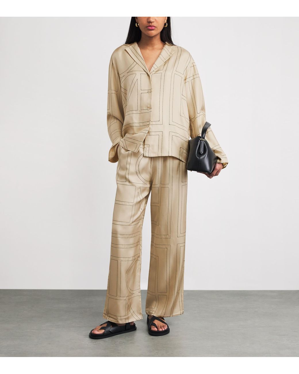 Totême Natural Silk Monogram Trousers