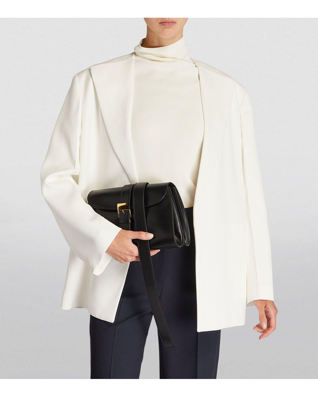 The Row Leather Isla Clutch Bag in Black | Lyst Canada