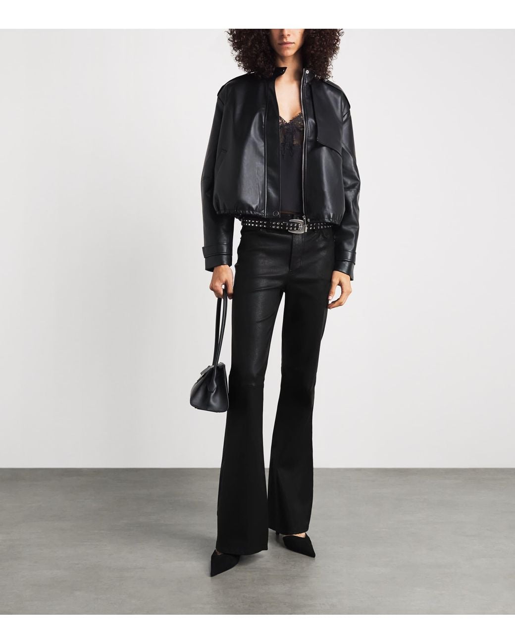 FRAME Black The Flared Leather Trousers
