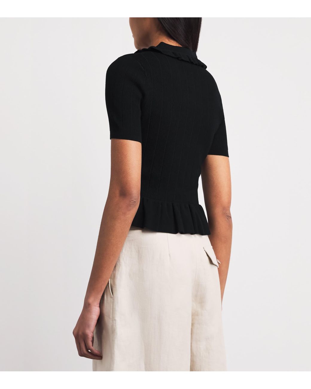 Claudie Pierlot Black Knitted Ribbed Peplum Sweater