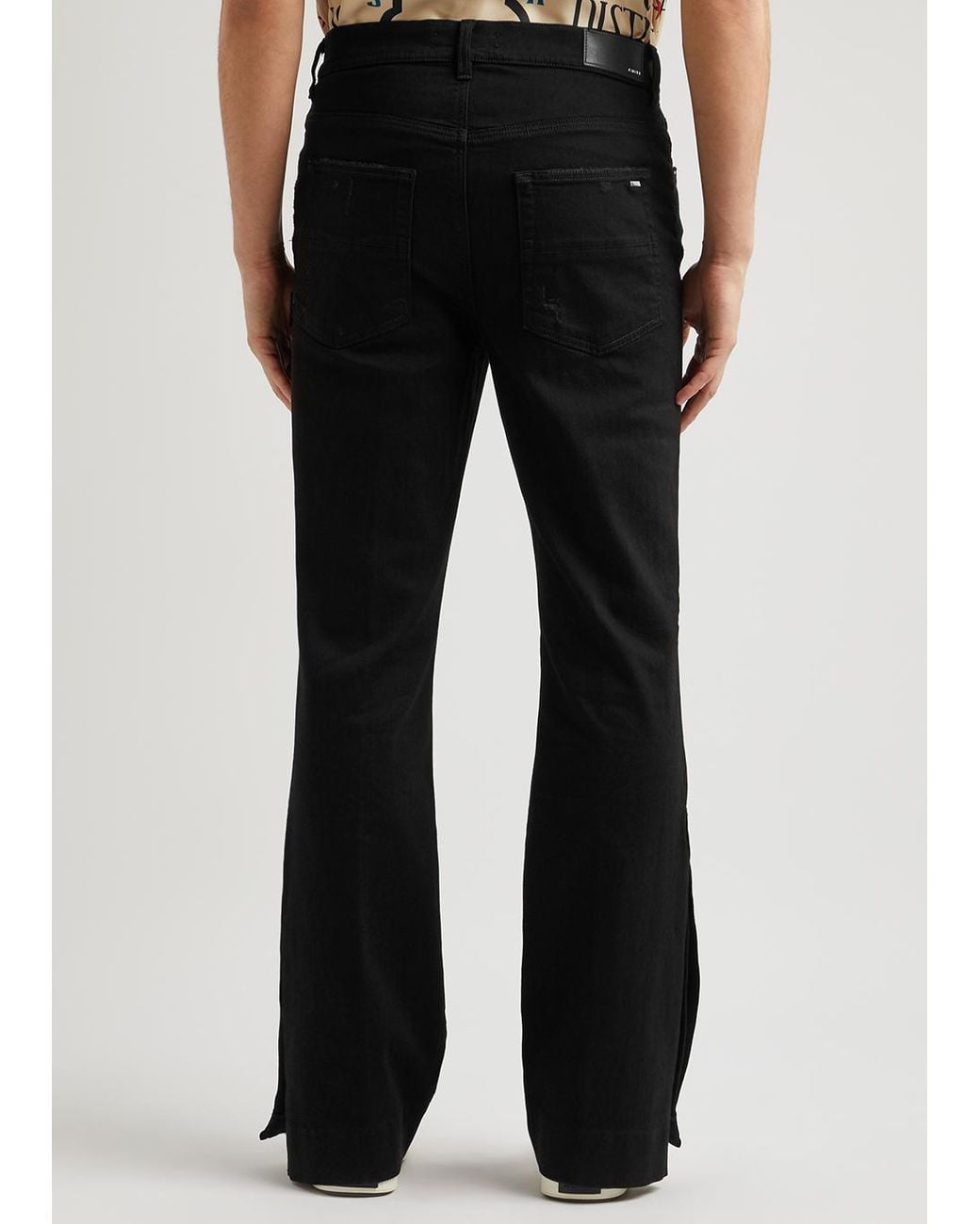 amiri-BLACK-Stack-Flared-leg-