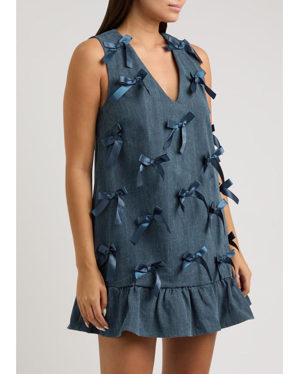 【英国発Sister Jane】Lyrical bow-embellished denim dress Sister Jane Lyrical Bow-Embellished Denim Mini Dress in Blue