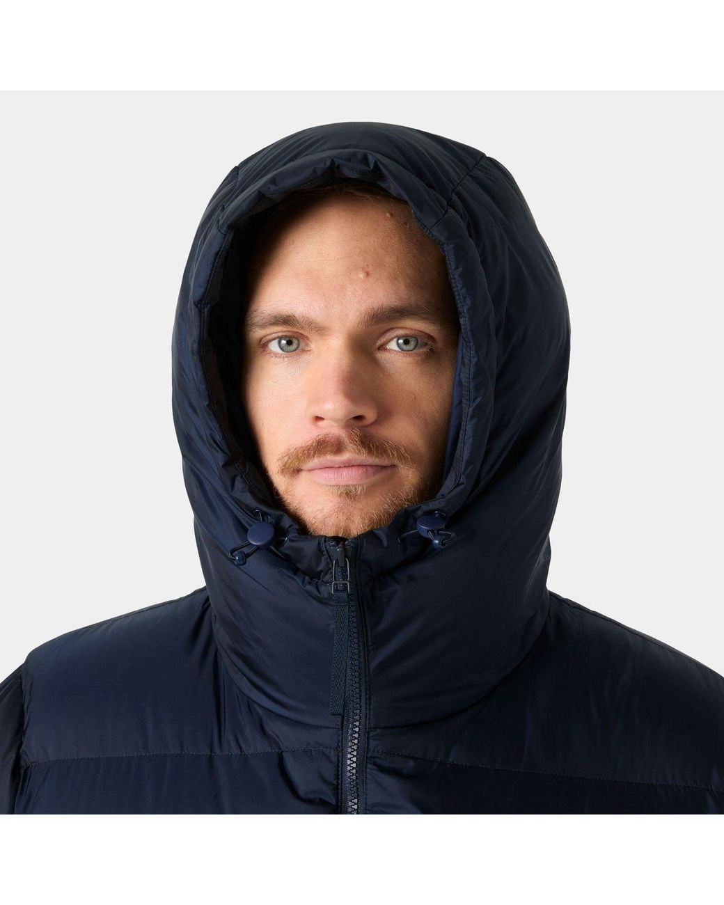 Stride Puffy Parka Helly Hansen de hombre de color Blue