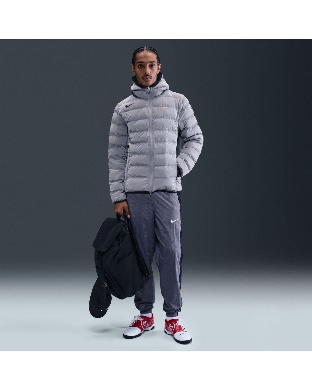 Nike Blue Solid Patterned Zipped Pocket Hooded Woven Cuff Puffer Jacket for men