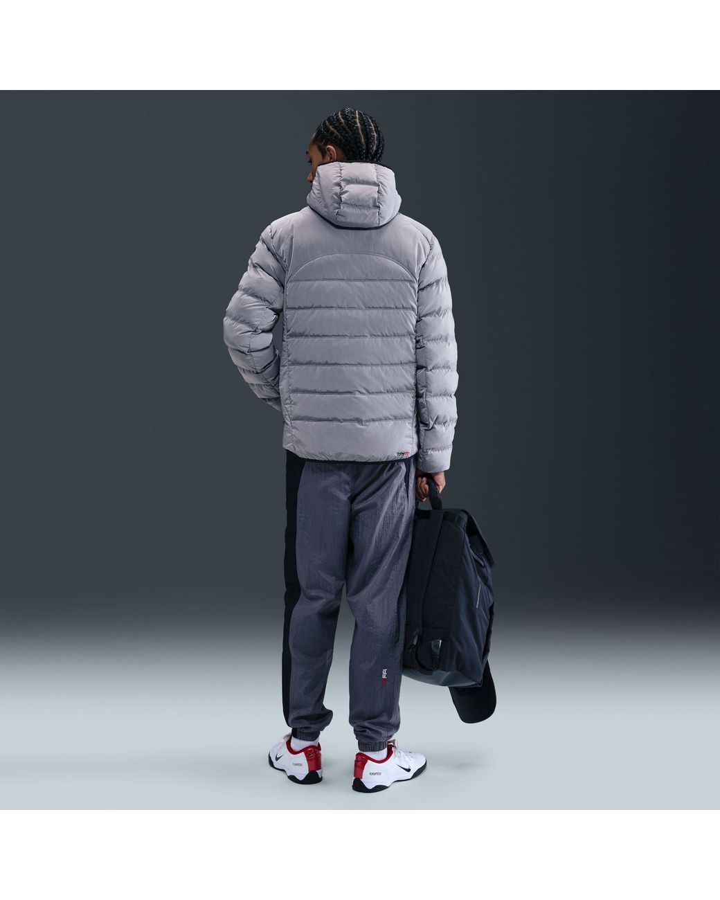 Nike Blue Solid Patterned Zipped Pocket Hooded Woven Cuff Puffer Jacket for men