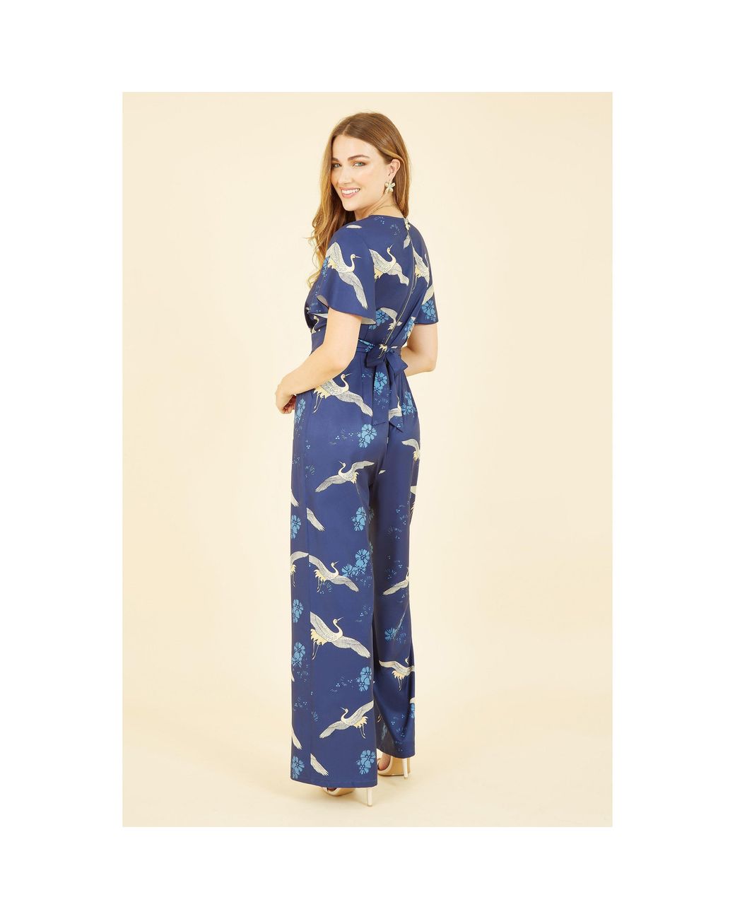 Yumi' Blue Crane Print Angel Sleeve Jumpsuit