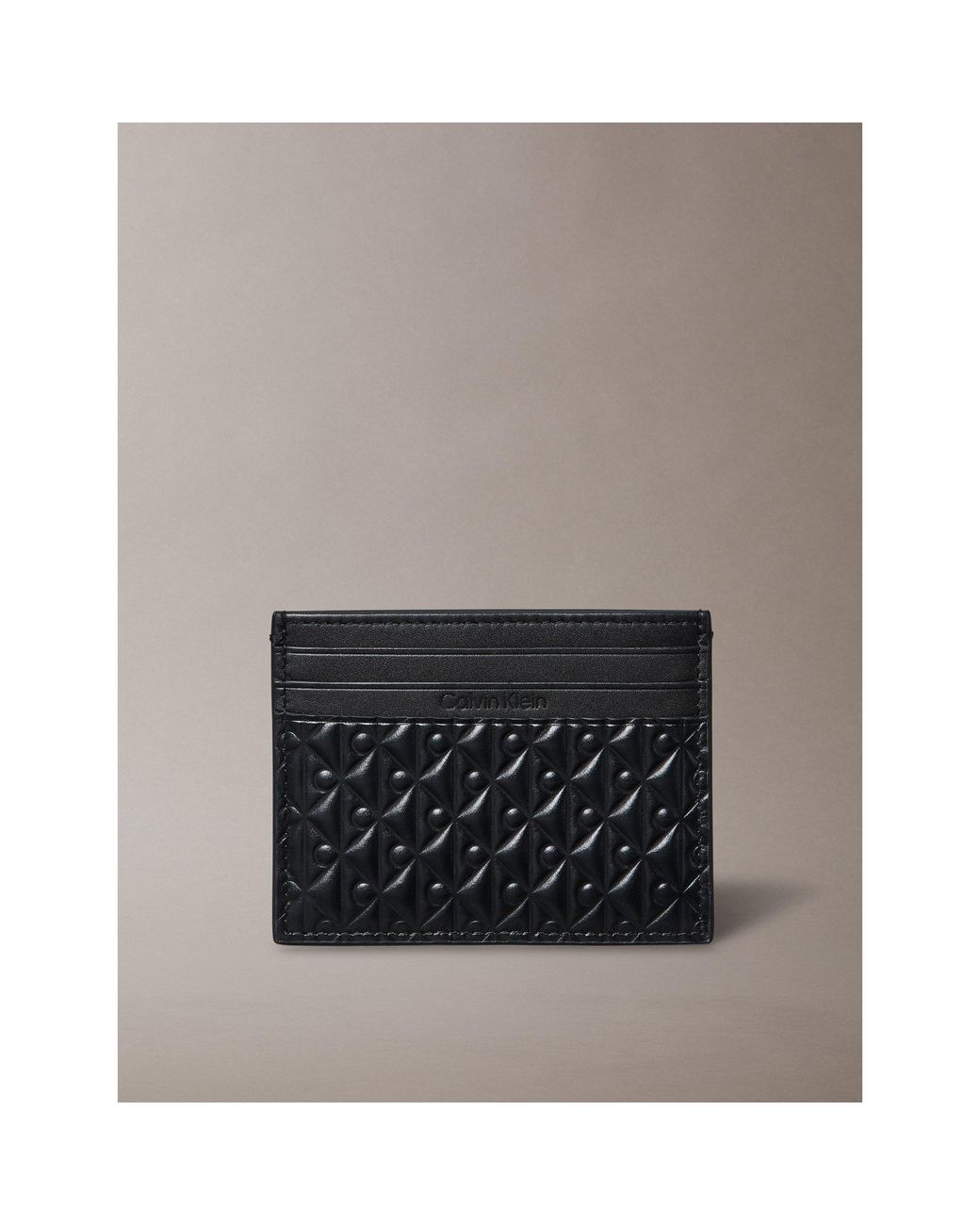 Calvin Klein Black Embossed Emblem Leather Card Holder for men
