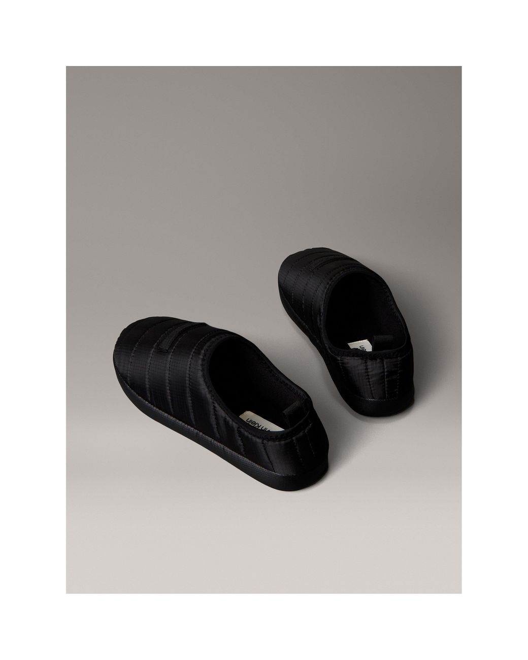 Calvin Klein Black Puffer Moccasin Slippers for men