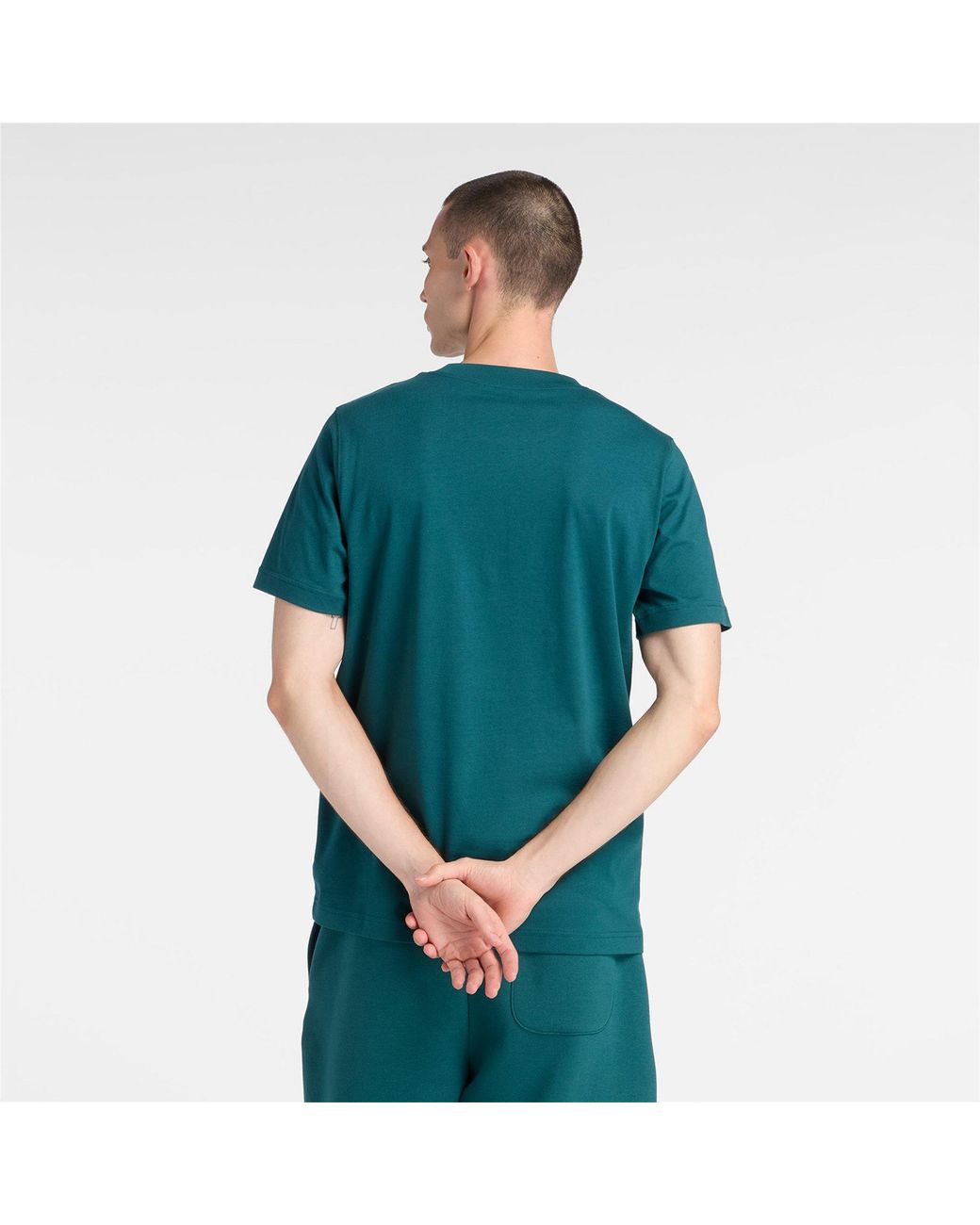 New Balance Green Fleece Jogger Shorts for men