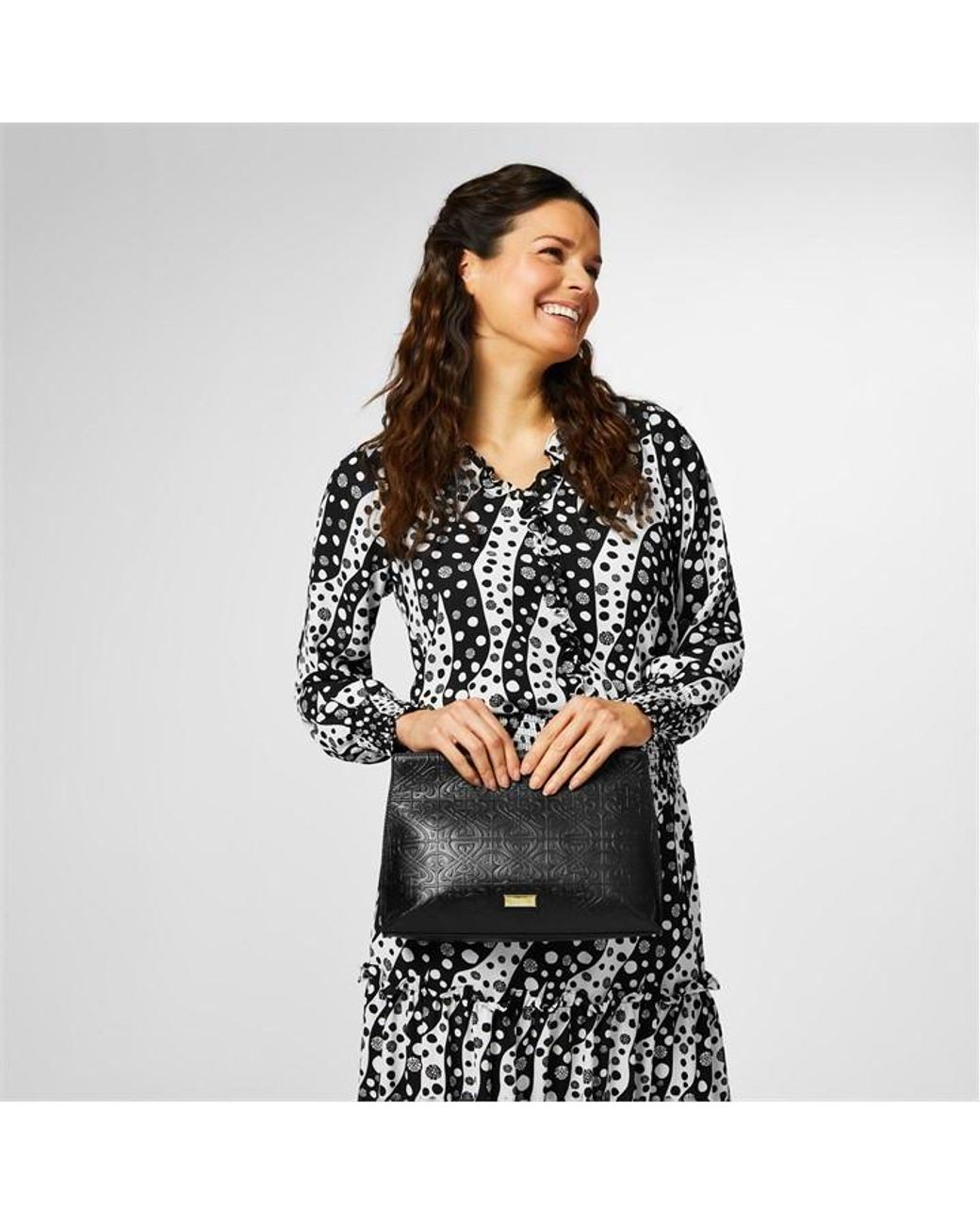 Biba Leather Filigree Embossed Clutch Bag in Black Lyst UK