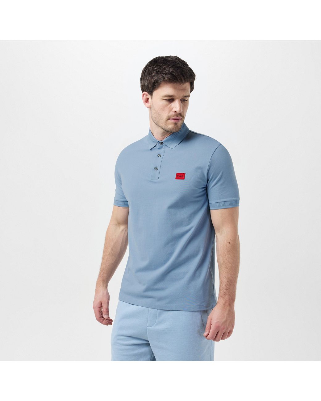 HUGO Blue Deruso Short Sleeve Polo Shirt With Logo Detail And Ribbed Collar for men
