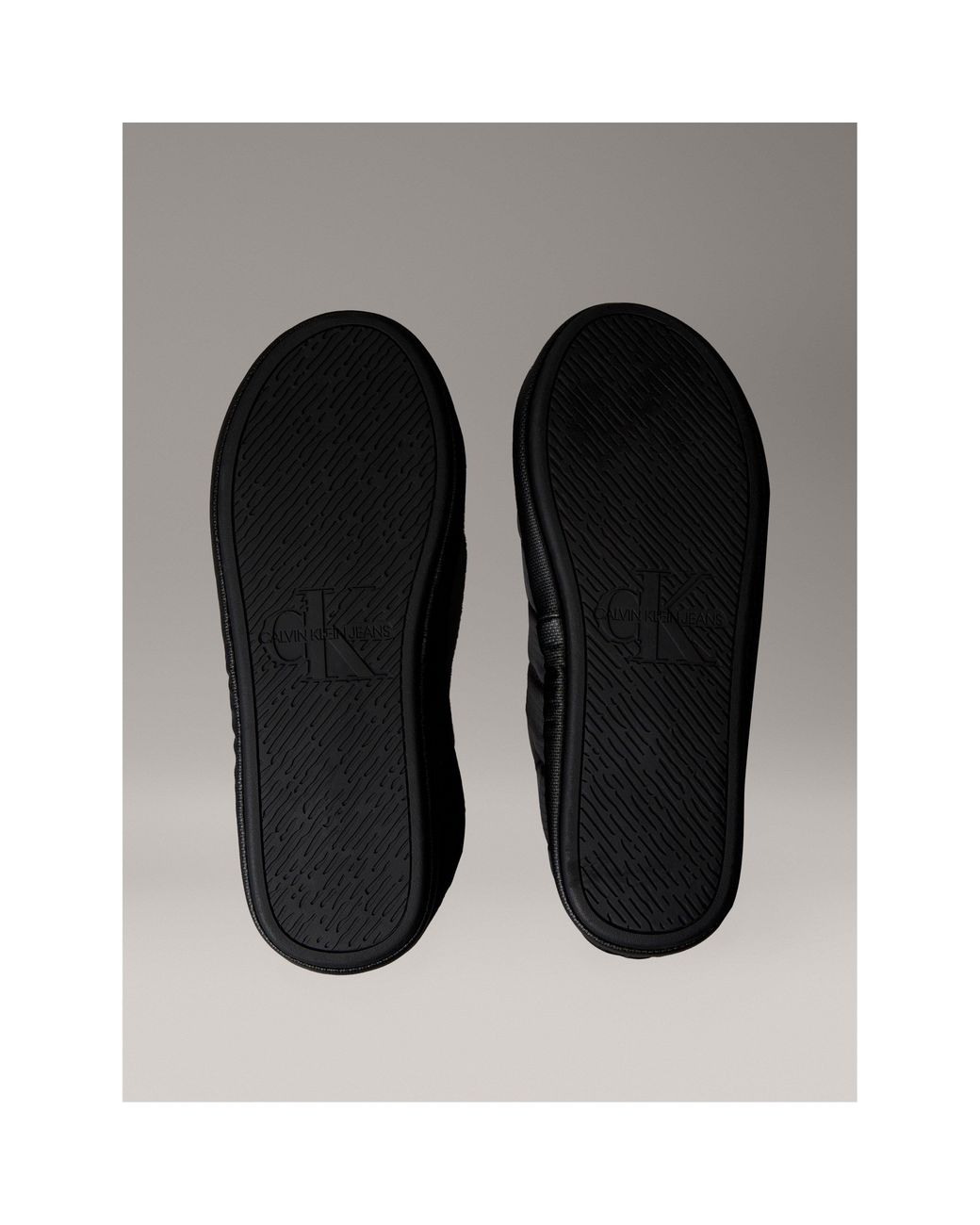 Calvin Klein Black Puffer Moccasin Slippers for men