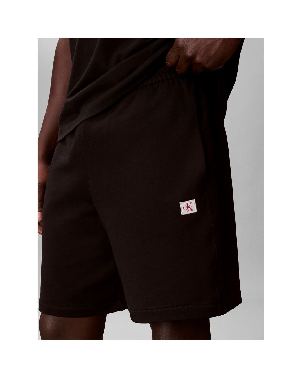 Calvin Klein Black Woven Badge Fleece Jogger Shorts for men