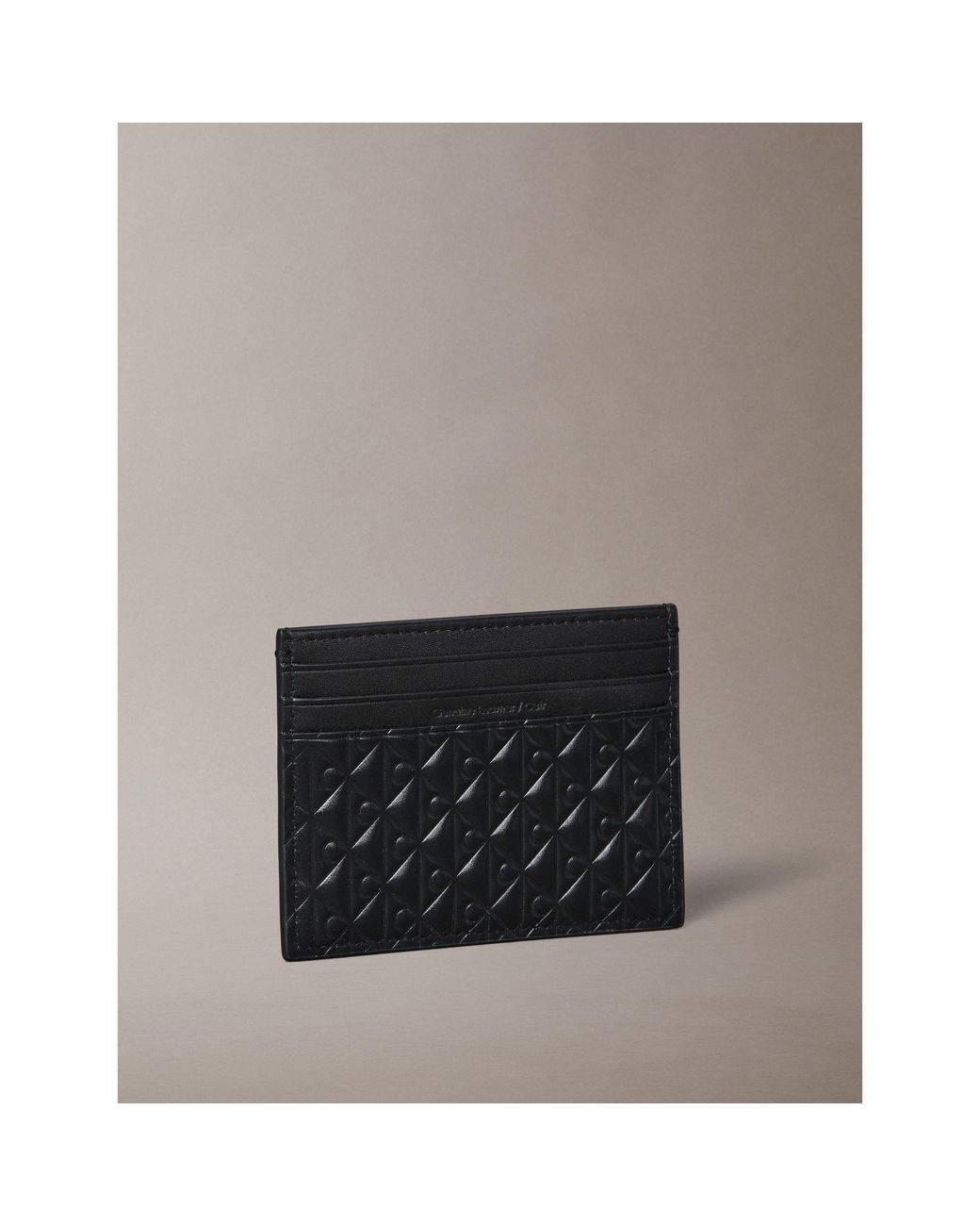Calvin Klein Black Embossed Emblem Leather Card Holder for men