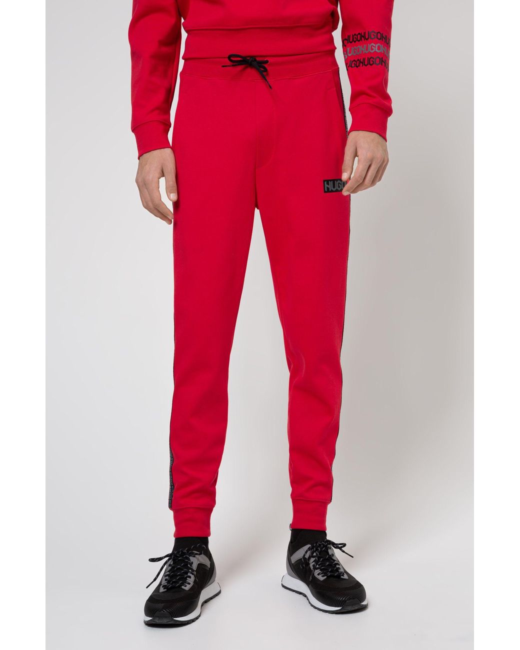 BOSS by Hugo Boss Cotton Terry Tracksuit Bottoms With Tire Print Logos ...