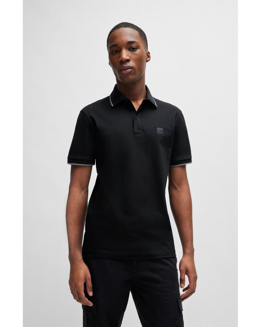 BOSS by HUGO BOSS Slim-Fit Poloshirt aus Stretch-Baumwolle mit Logo-Aufnäher  in Schwarz für Herren | Lyst DE