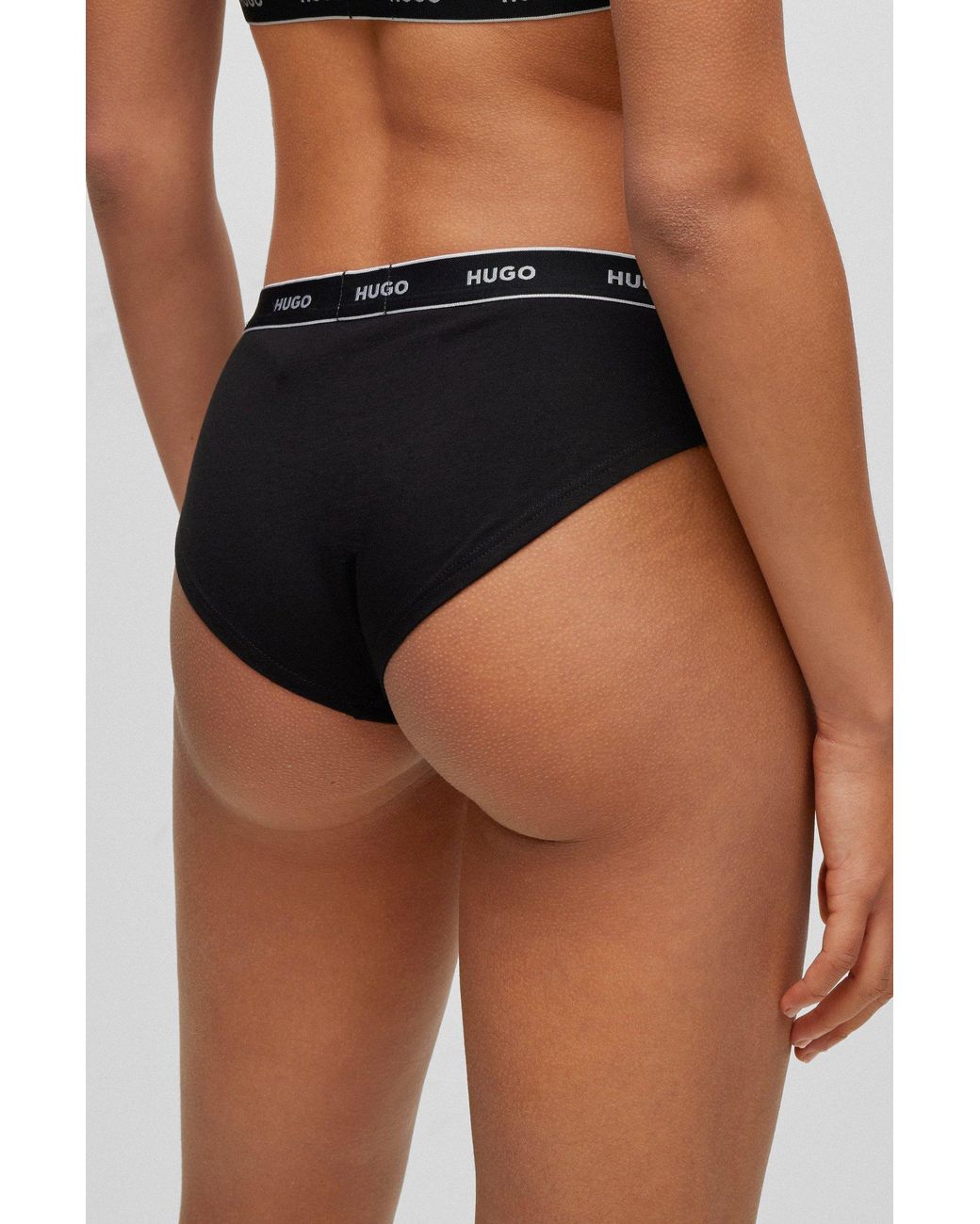 Three-pack of stretch-cotton thong briefs with logos