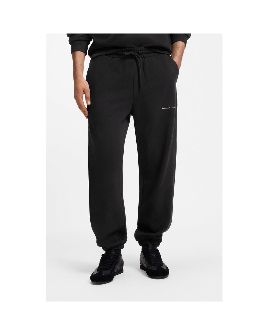 HUGO Black Relaxed-Fit Cotton Trousers With Streetwear Logo for men