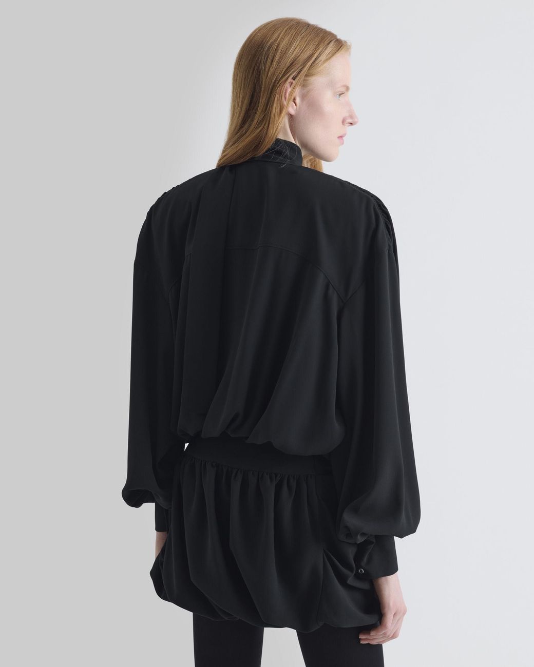 ROBE MINI DRAPÉE IRO en coloris Black