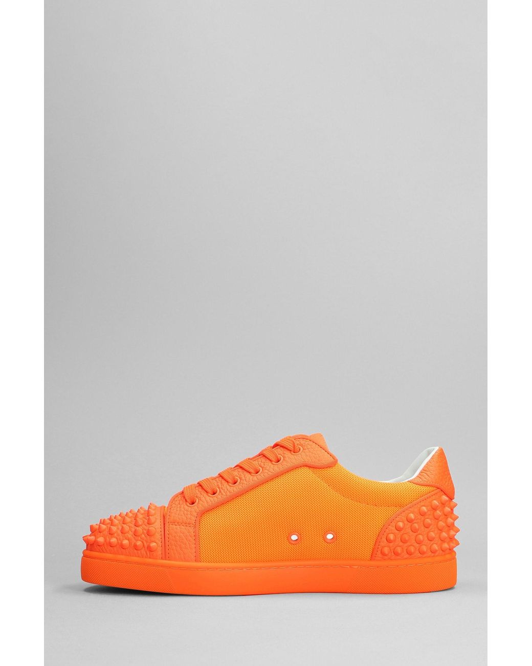 Orange 2025 louboutin sneakers