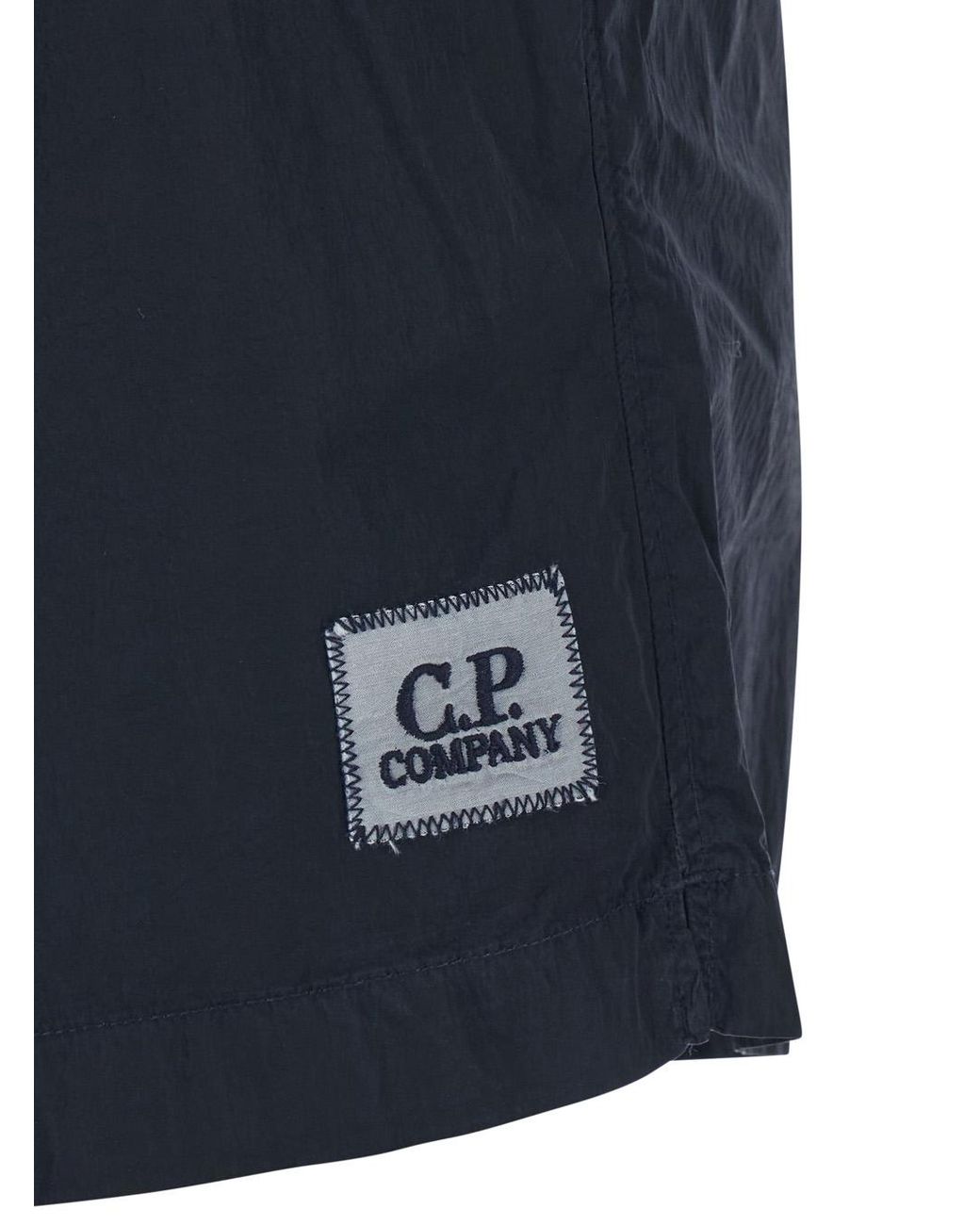 C P Company Blue Swim Shorts With Logo On The Front for men