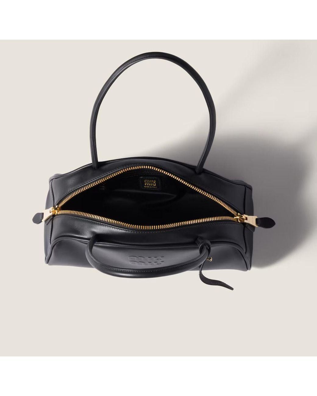 Miu Miu Black Miu Miu Embossed Logo Top Handle Bag