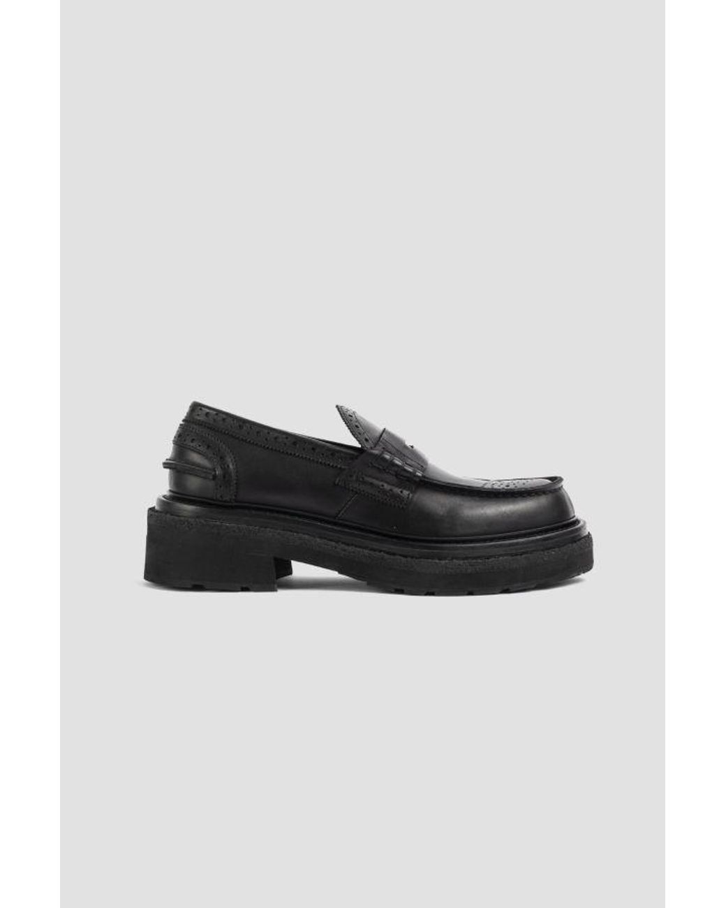 Sacai Black Wingtip Loafers