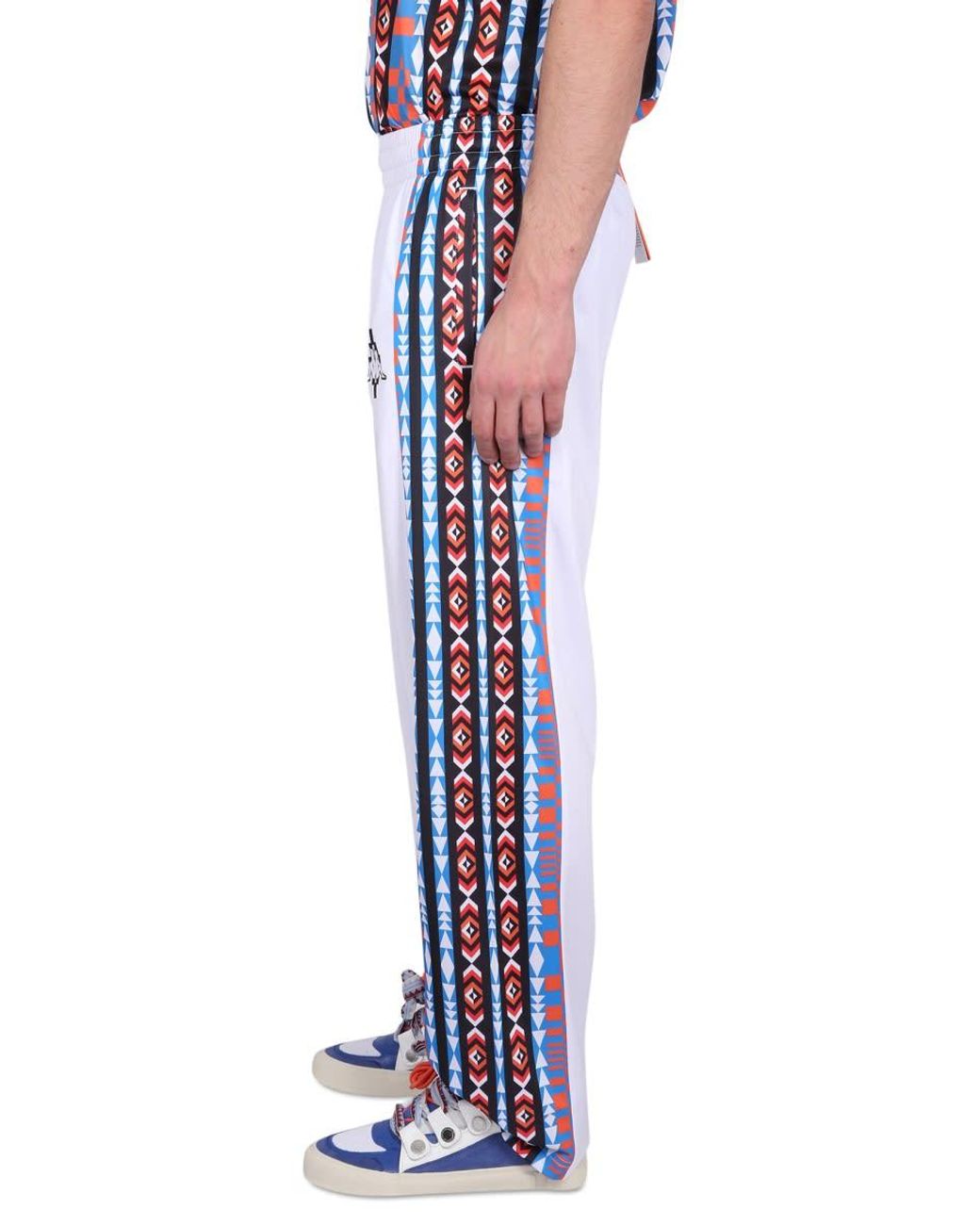 Marcelo Burlon Blue Jogging Pants With High Neck And Zipper Closure for men