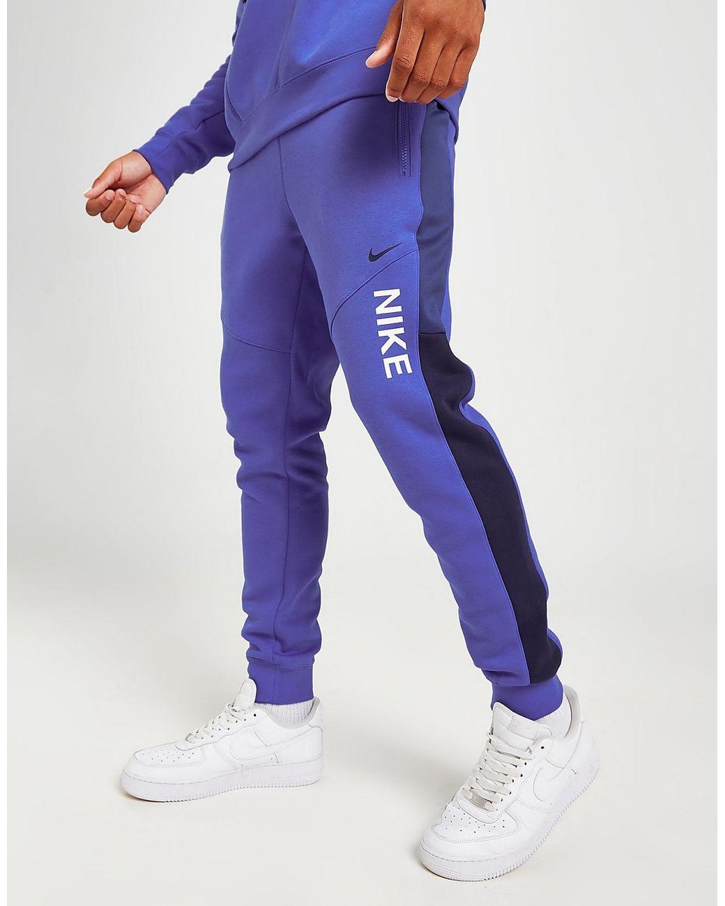 Nike Hybrid Fleece Joggers in Blue for Men | Lyst UK