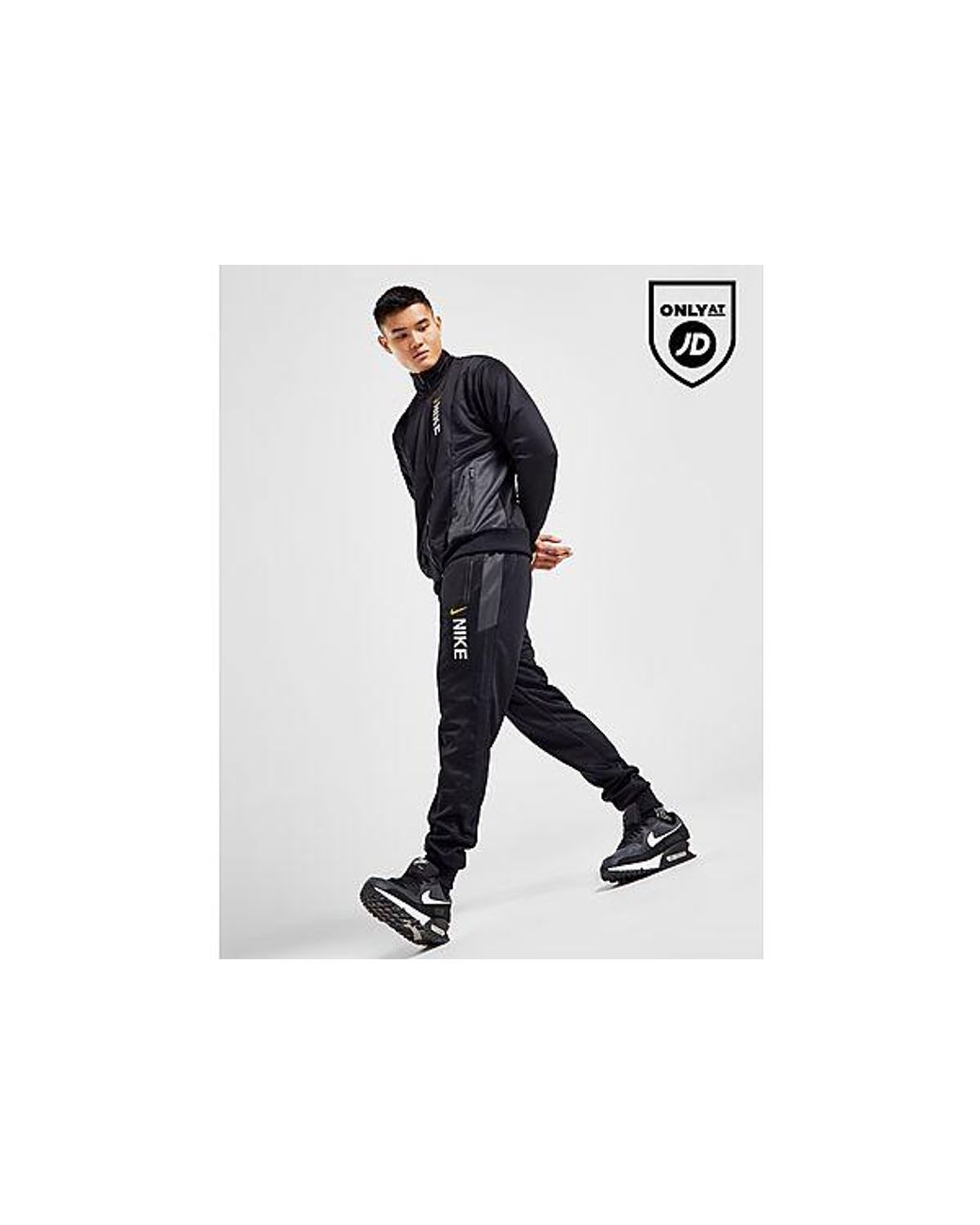 Hybrid Poly Knit Track Pants Nike pour homme en coloris Noir Lyst