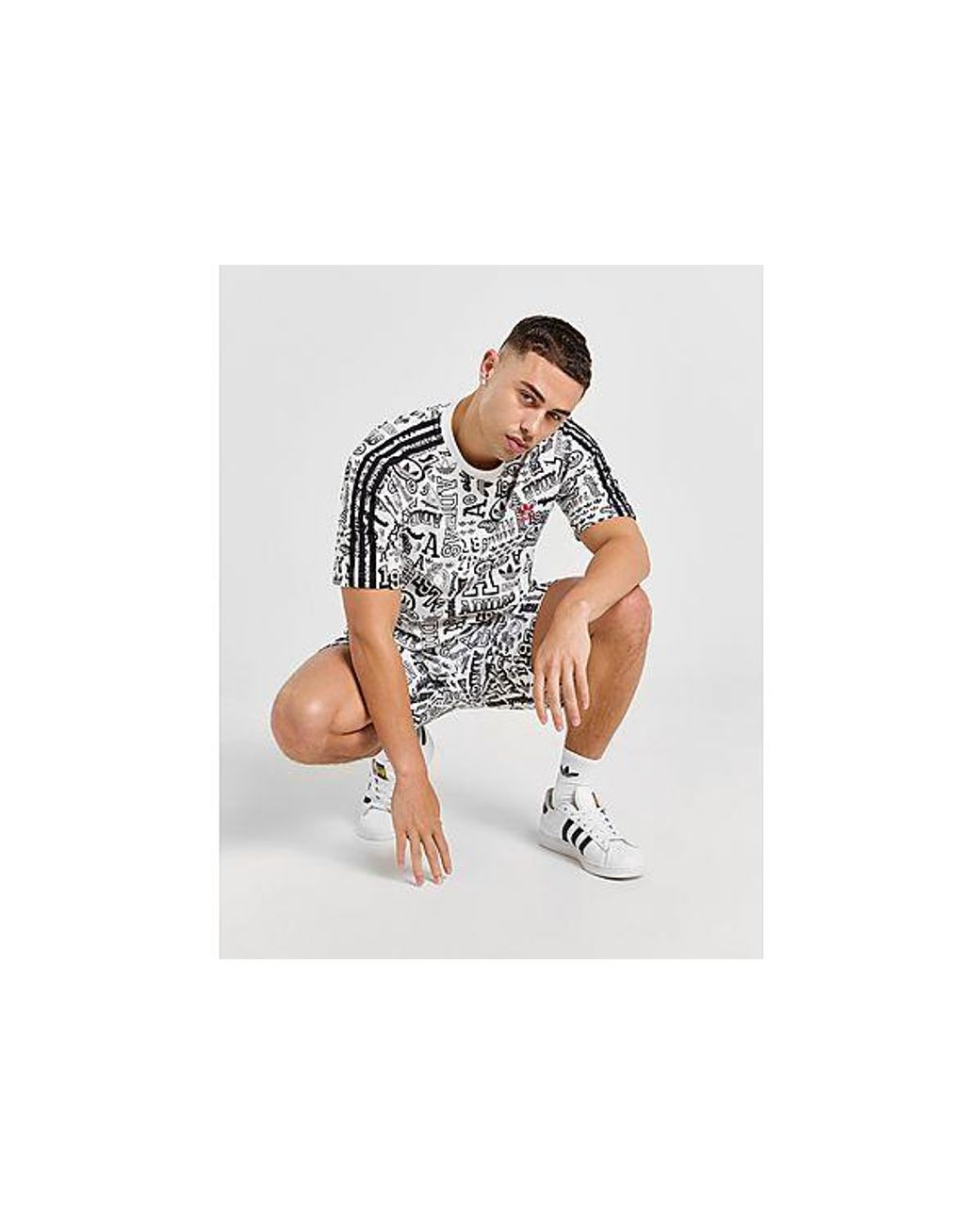 Adidas sticker t shirt new arrivals