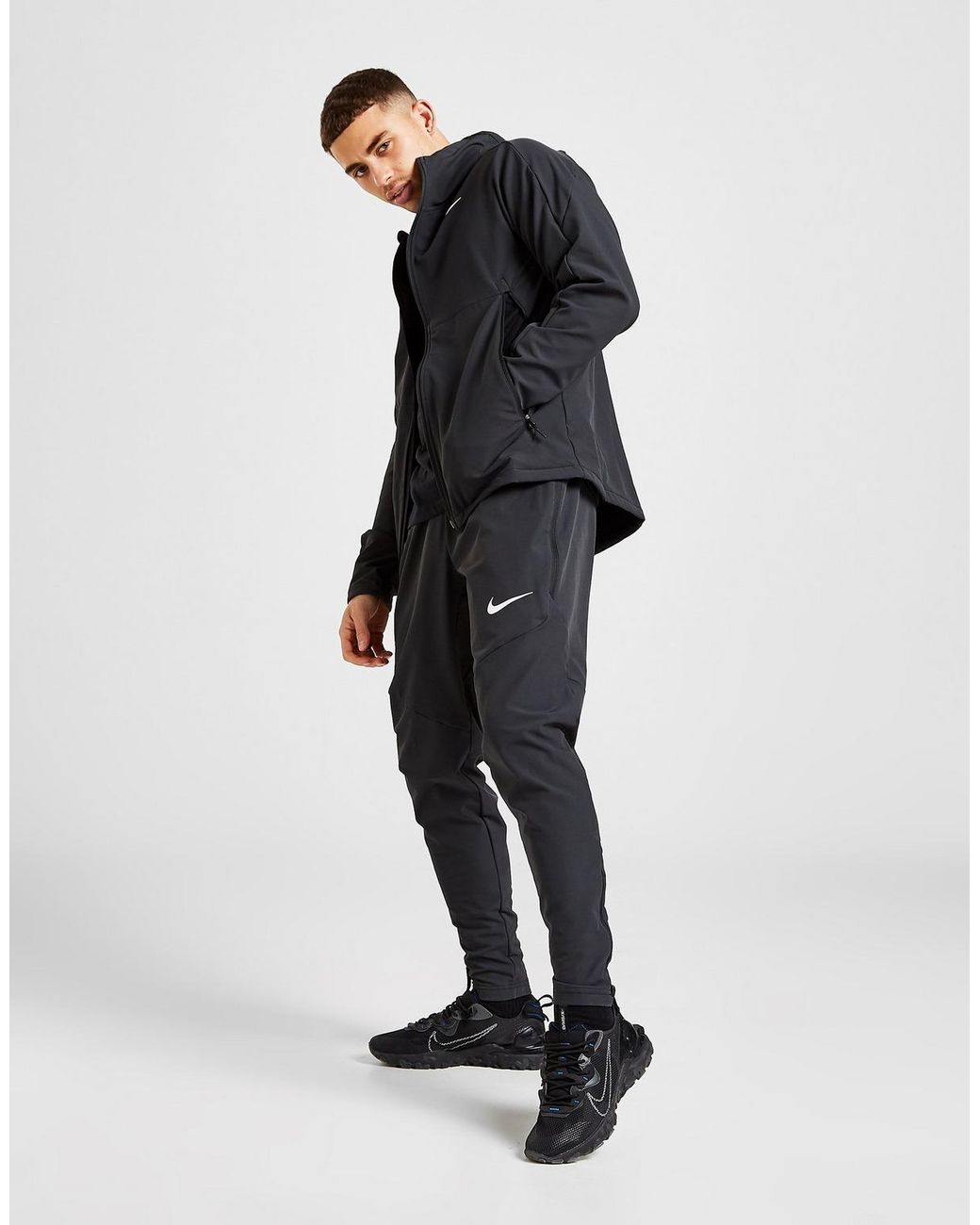 nike shield woven track pants