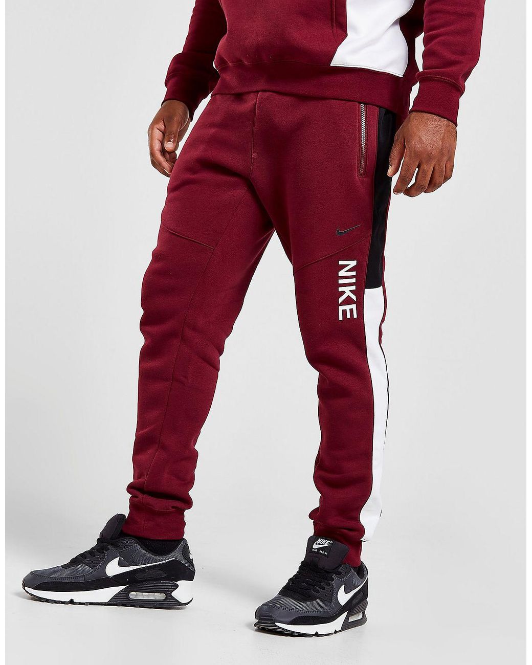 Nike Hybrid Fleece Joggers in Red for Men | Lyst UK