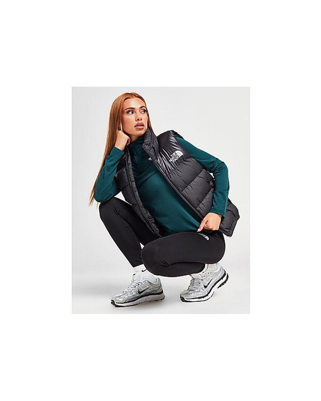 The north face online black gilet