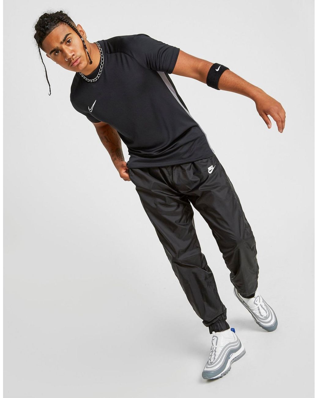 nike woven tracksuit bottoms