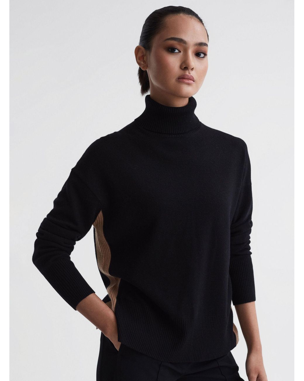 camel coloured polo neck