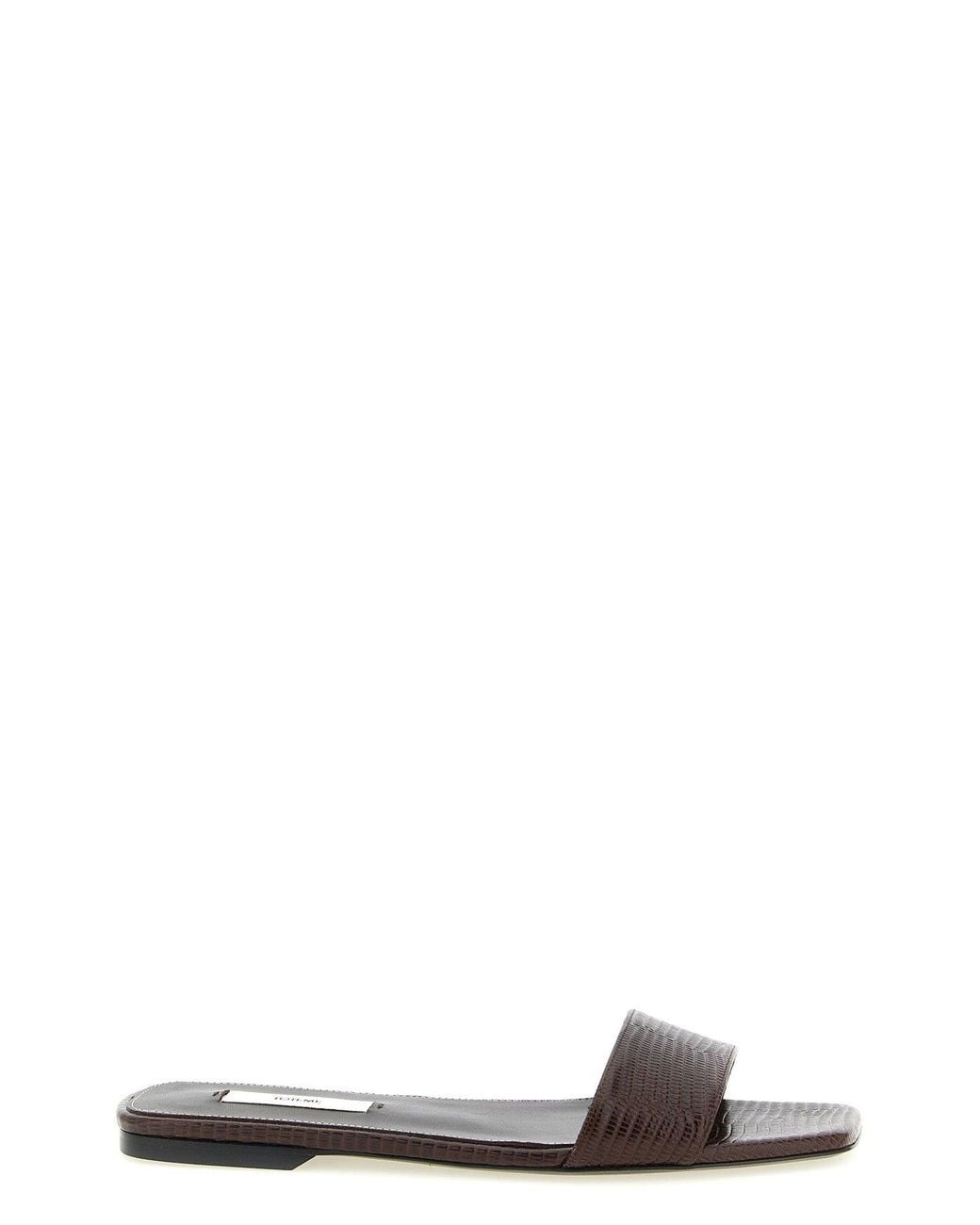 Totême Black Slide Sandal With Lizard-Embossed Texture