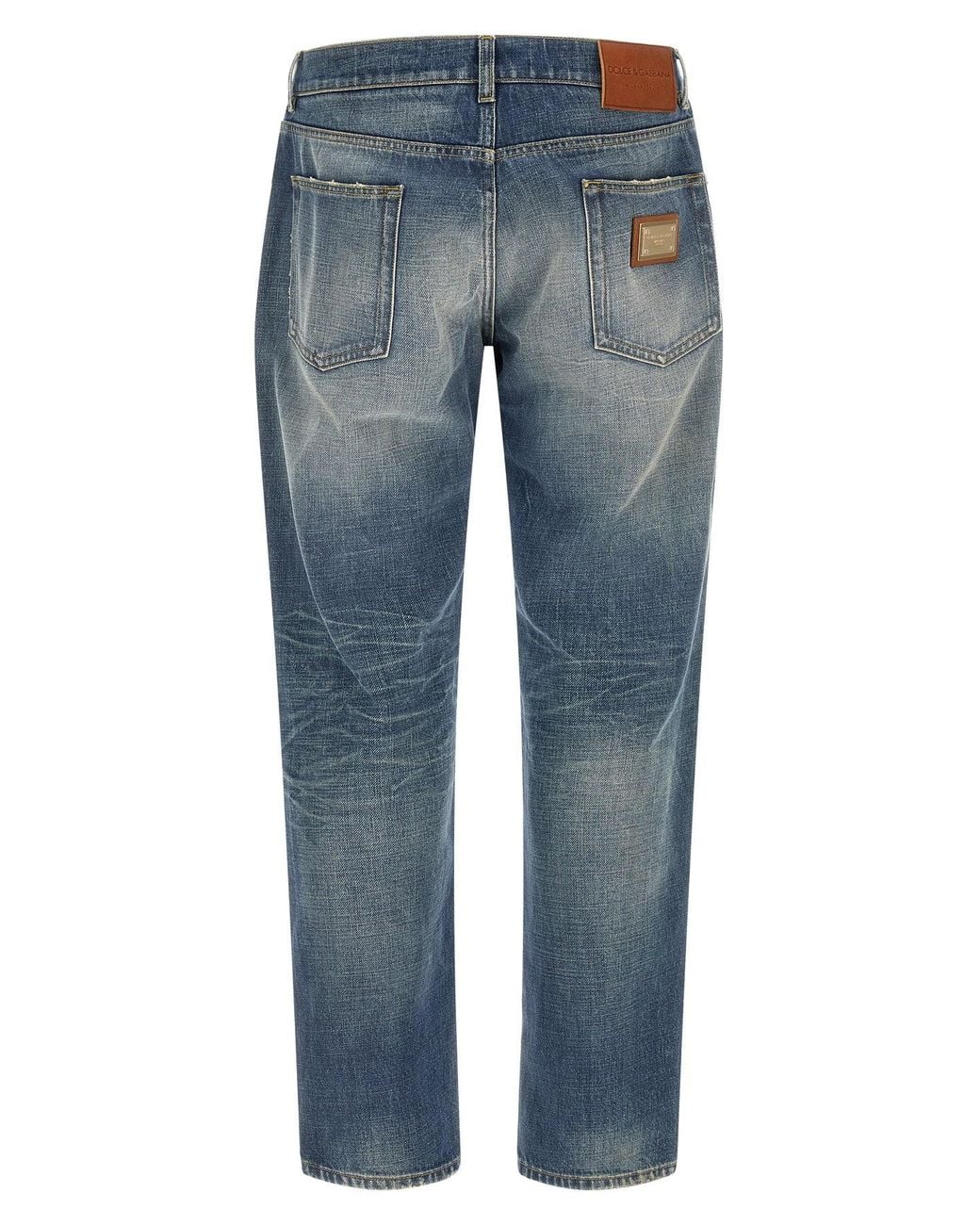 Dolce & Gabbana Blue Distressed Denim Jeans With Signature Plaque for men