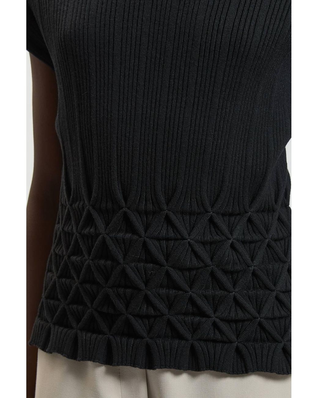 Karen Millen Black Ribbed Knit Power Shoulder Top With Manipulated Stitch Detail