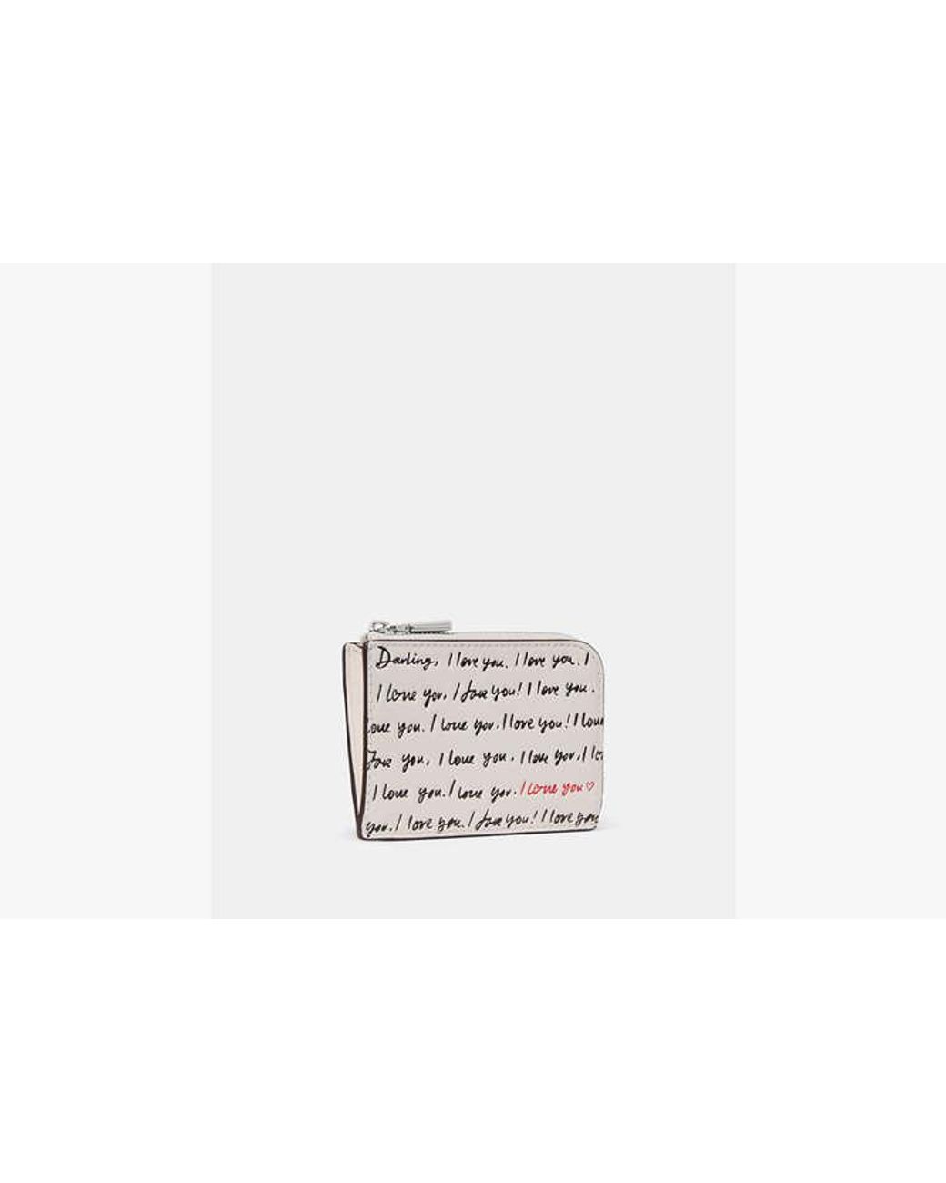 Kate Spade White Embossed Leather Mini Zip Card Case