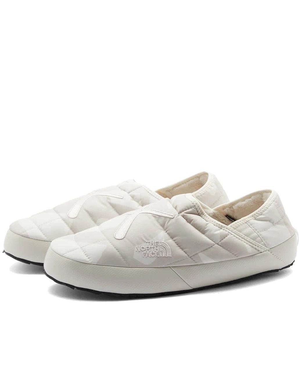 The North Face Black X Kaws Thermoball Traction 'Moonlight Ivory' for men