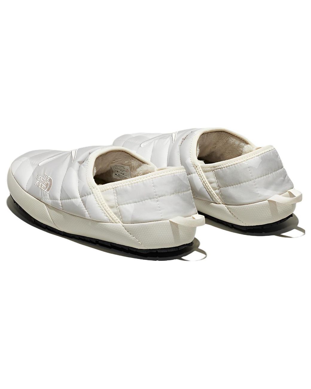 The North Face Black X Kaws Thermoball Traction 'Moonlight Ivory' for men