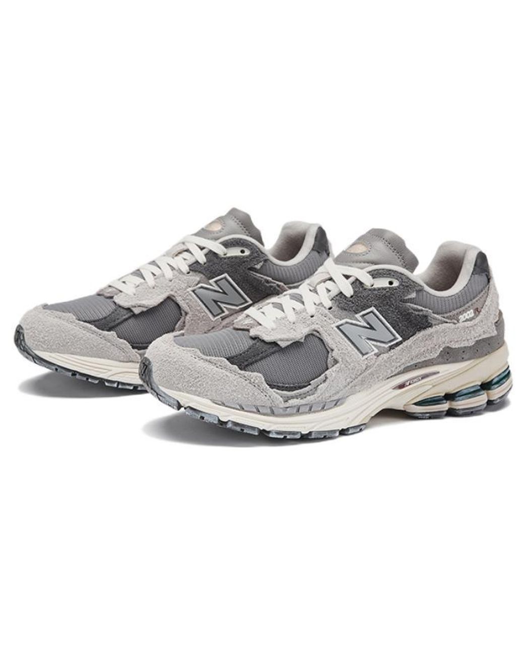 New Balance White 2002r Protection Pack Sneakers Rain Cloud / Magnet for men